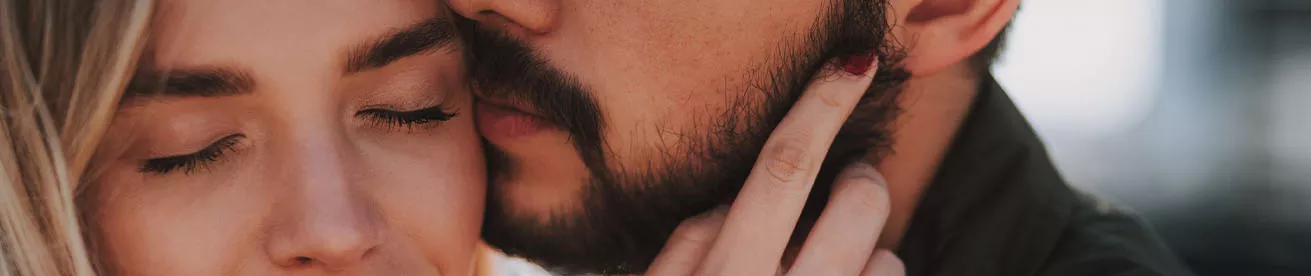 couple with faces close